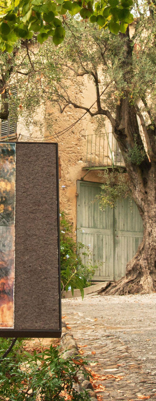Historic stone house with art display