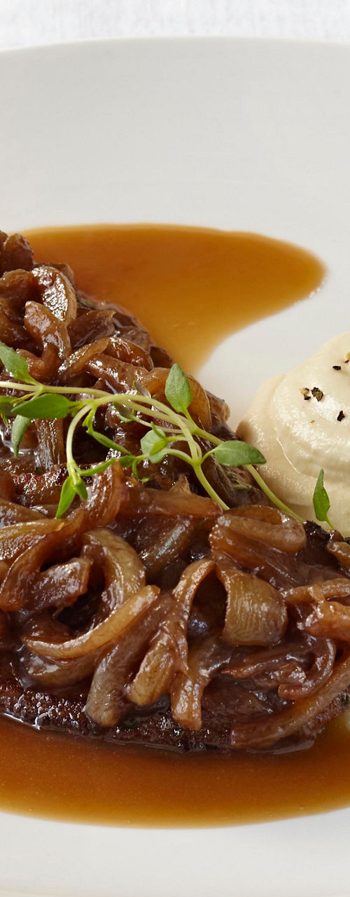 Braised beef with onions and mashed potatoes