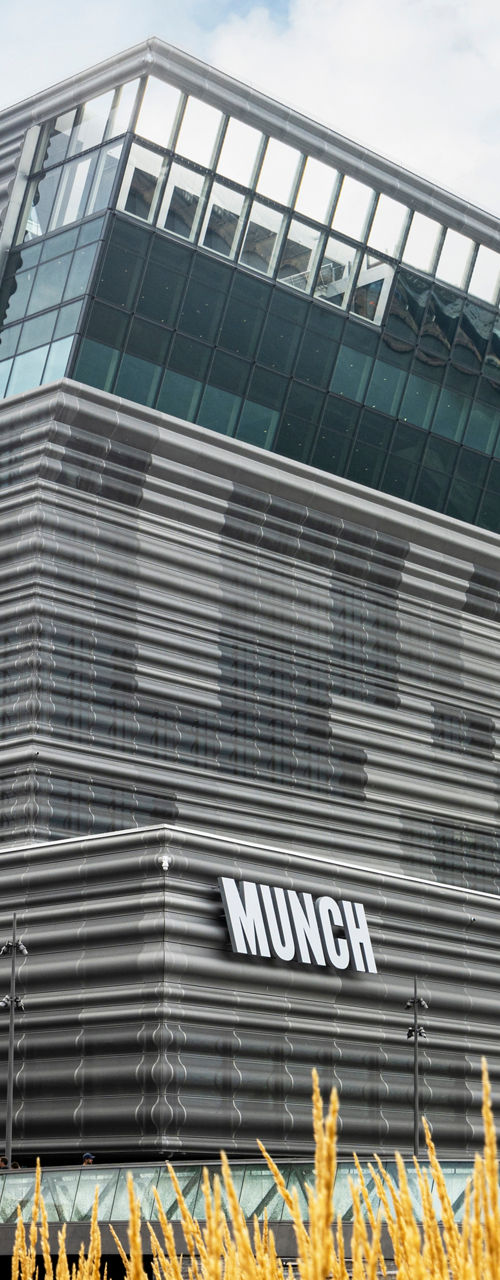 Modern Munch Museum with golden grass foreground