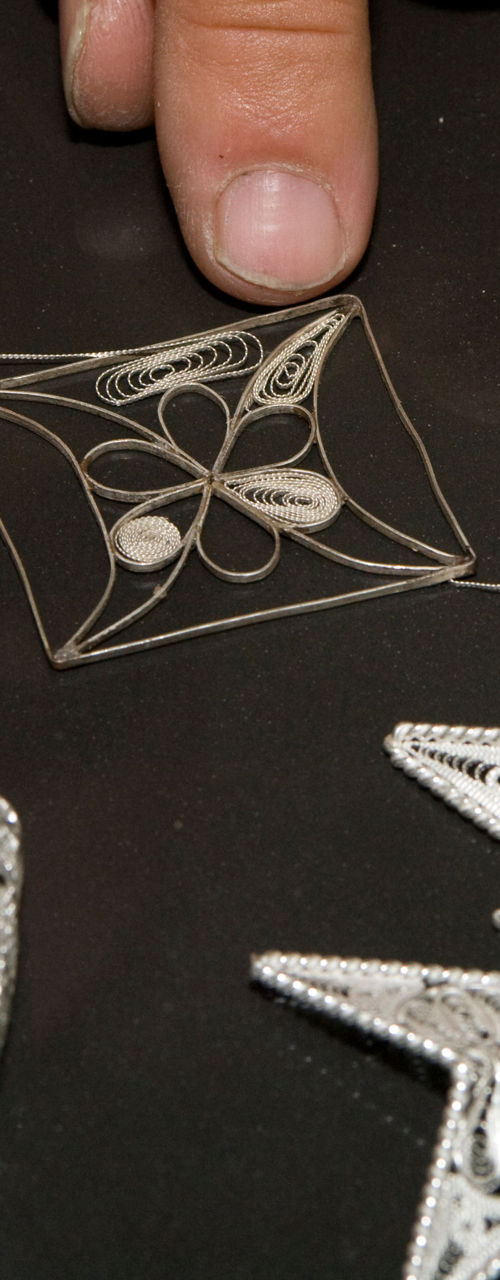 Handcrafting intricate silver filigree jewelry