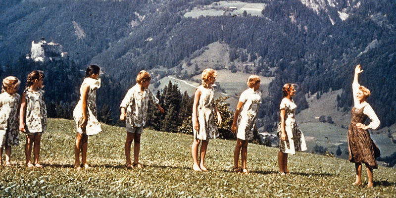 Children playing outdoors in mountain scenery