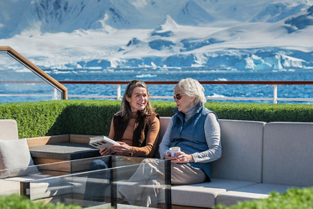 Women relaxing on cruise deck in Antarctica