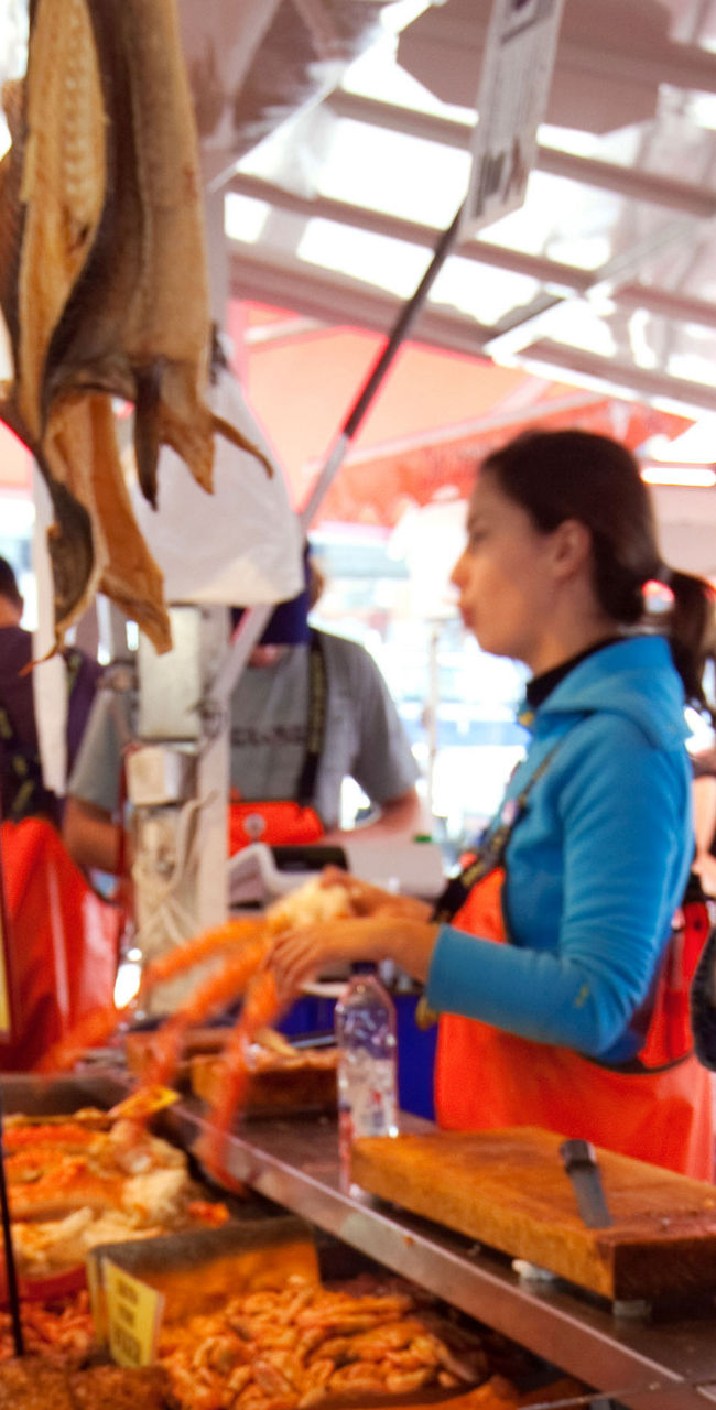 Seafood market stall with fresh dishes