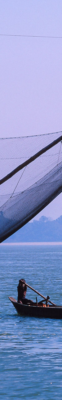 Traditional fishing boat with large net