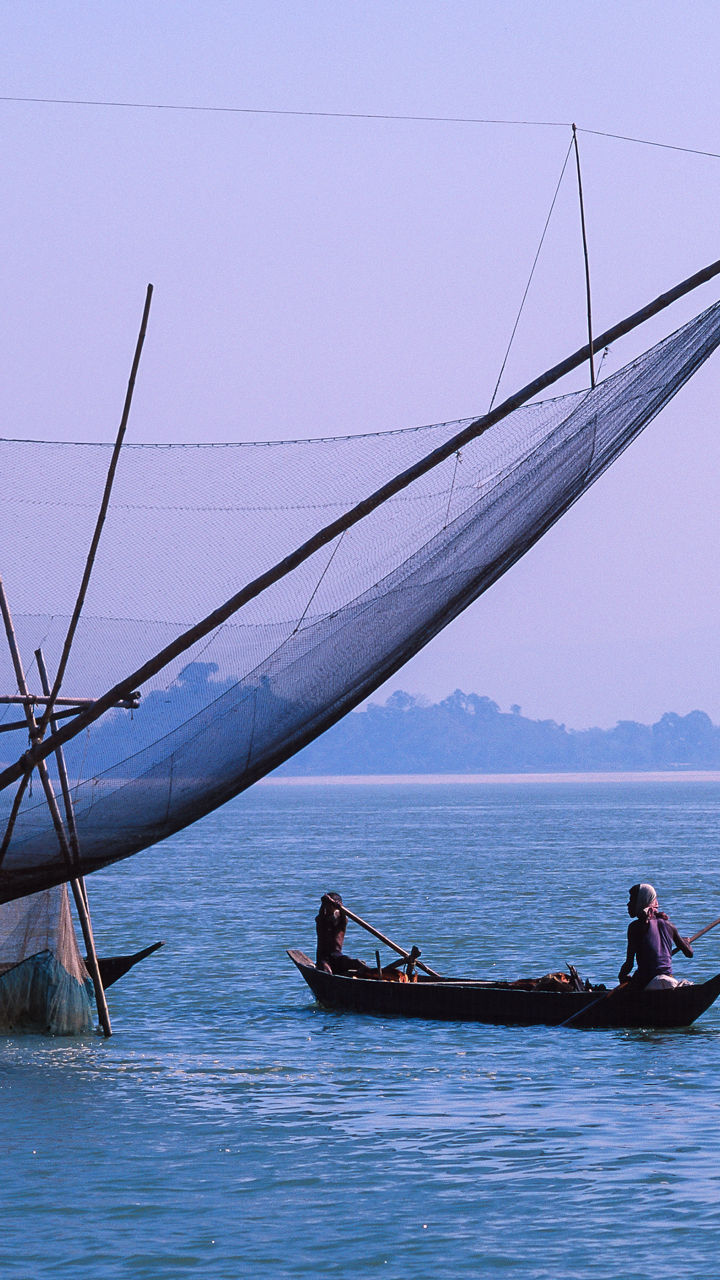 Traditional fishing boat with large net