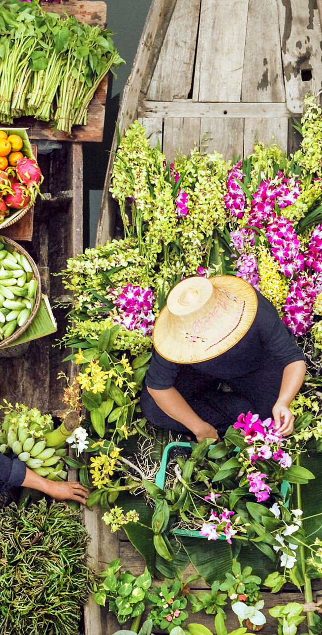 Floating market with vibrant produce and flowers