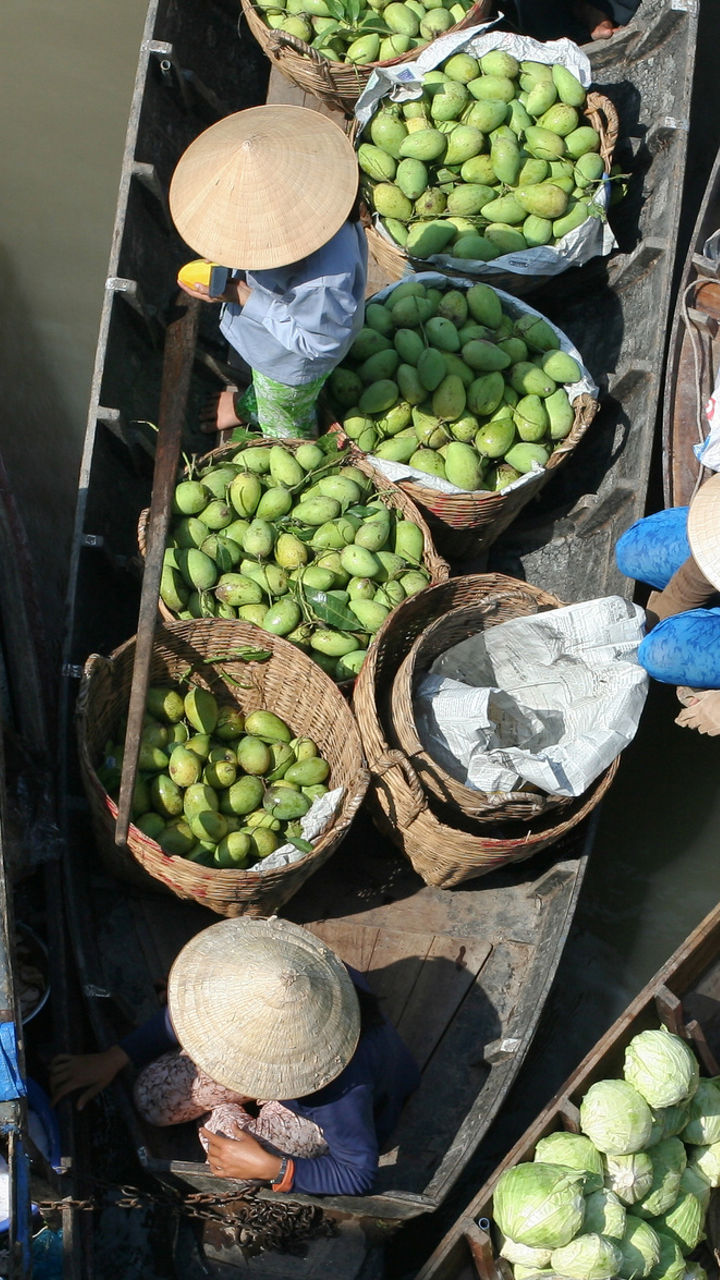 Floating market with fresh produce on boats