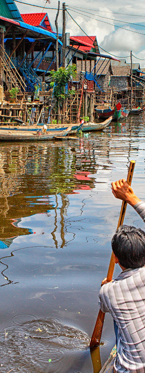 Traditional village on stilts with boats