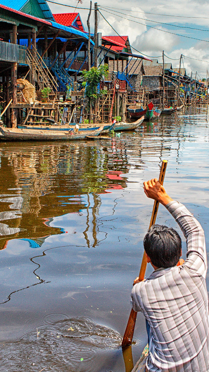 Traditional village on stilts with boats
