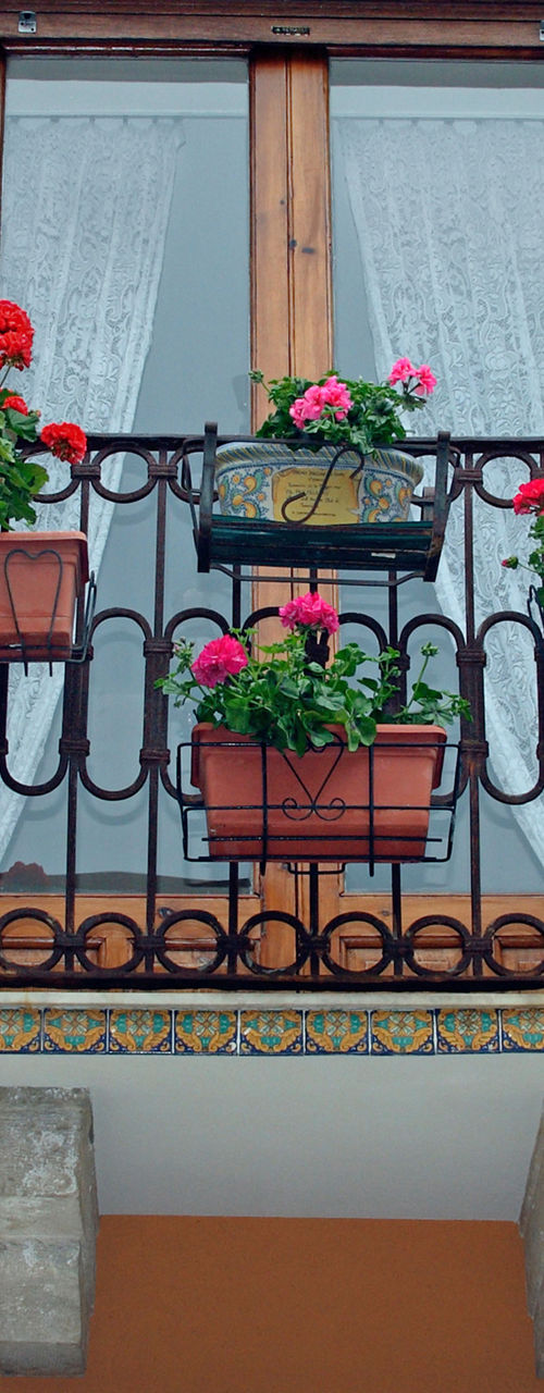 Colorful balcony with flowers and decor