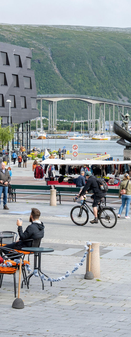 Outdoor café near waterfront in scenic town