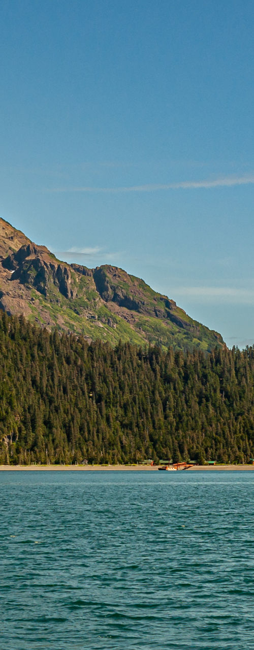 Scenic mountain lake under clear blue sky