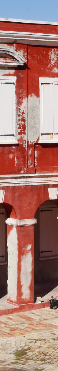 Historic red building with '1760' facade