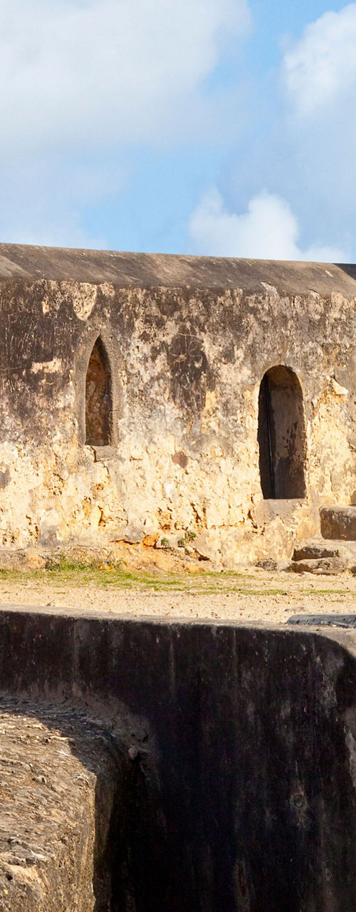 Historic stone fort with old cannon