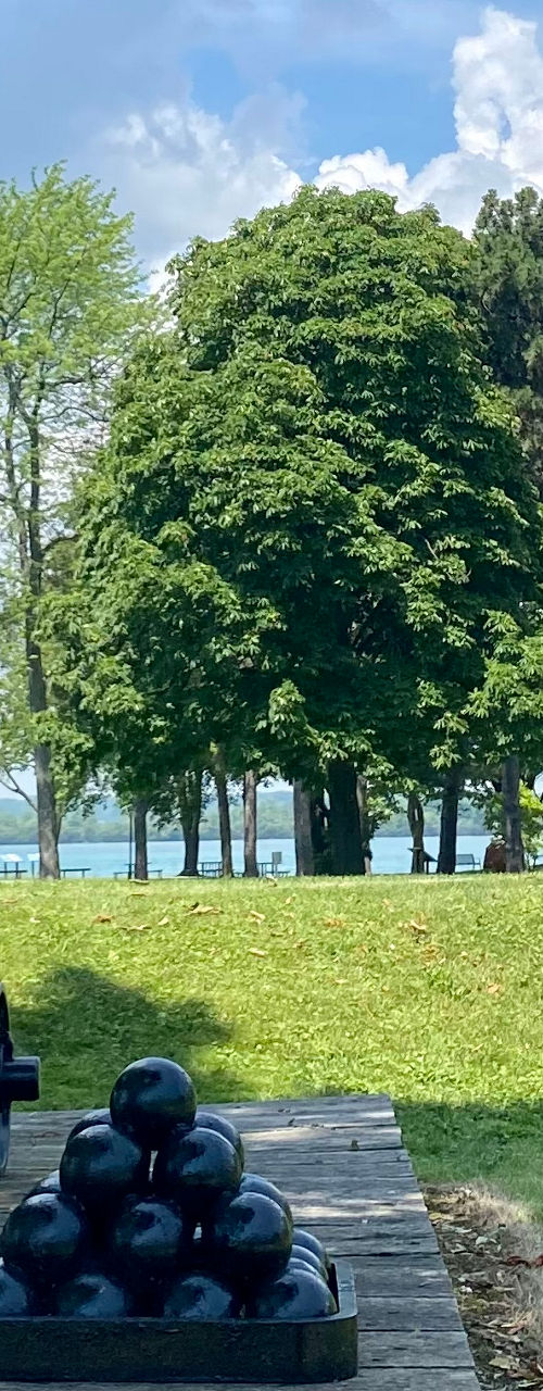 Historic cannon with Canadian flag in park