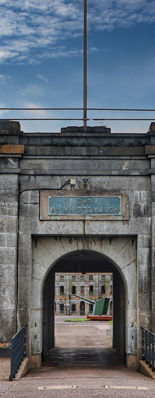 Historic stone fort with Irish flag