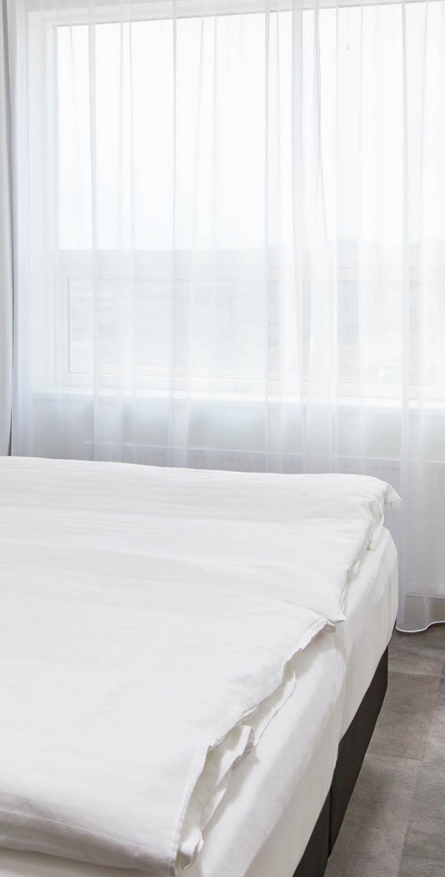 Modern hotel room with bright accents