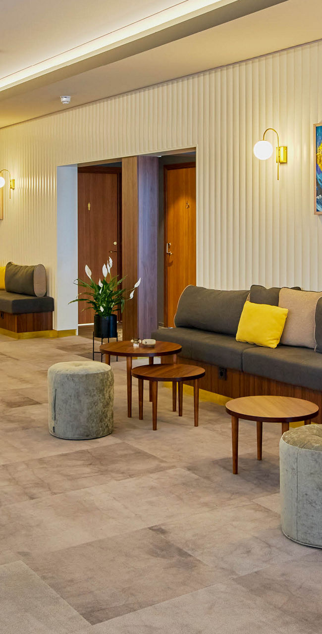 Modern lounge area with yellow accents