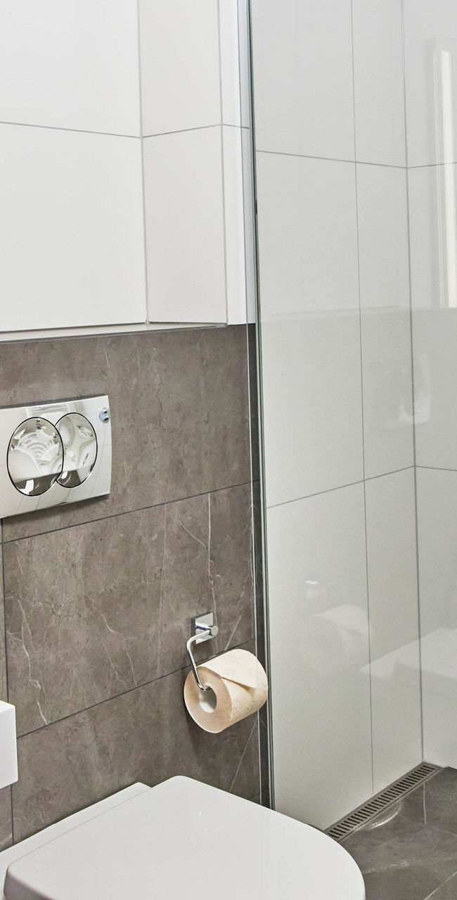 Modern bathroom with glass shower enclosure
