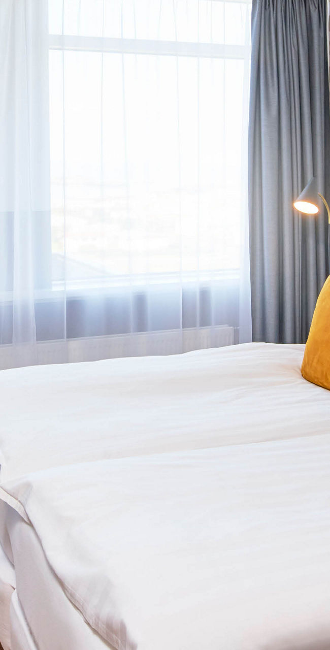 Cozy hotel room with bright accents