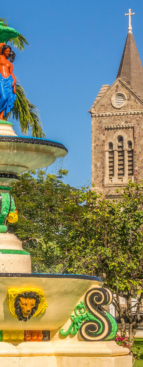Colorful fountain near historic cathedral