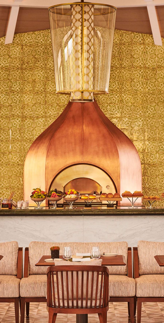 Elegant restaurant with central wood-fired oven