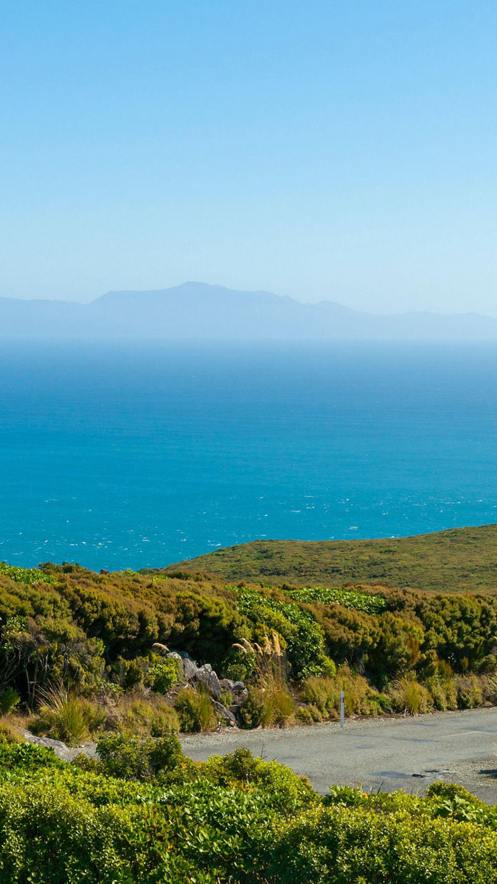 Scenic coastal view with clear blue sky