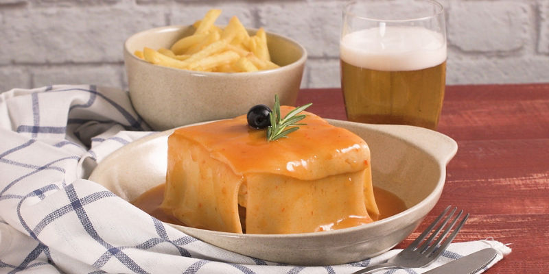 Traditional dish with fries and beer