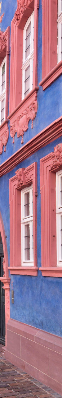 Colorful historic building on cobblestone street