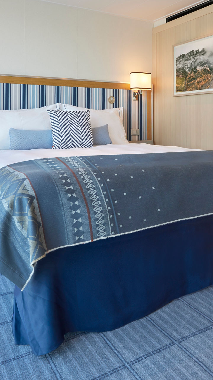 Modern hotel room with blue decor