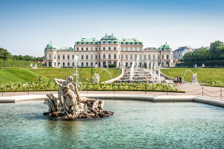 Historic palace with fountain and gardens