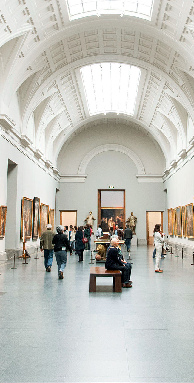 Art gallery interior with framed paintings