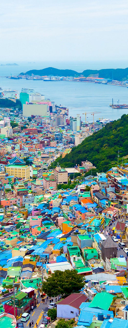Colorful hillside village overlooking harbor