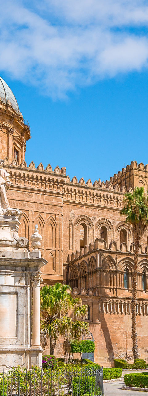 Palermo Cathedral with lush garden view