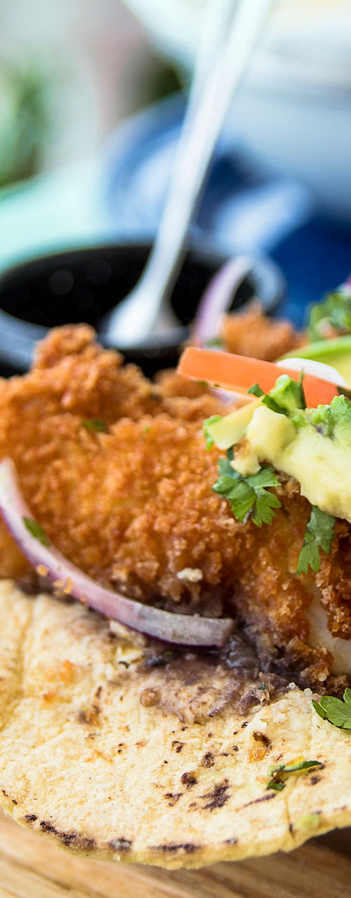 Crispy fish tacos with fresh toppings