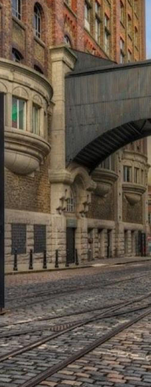 Guinness brewery entrance with cobblestone street