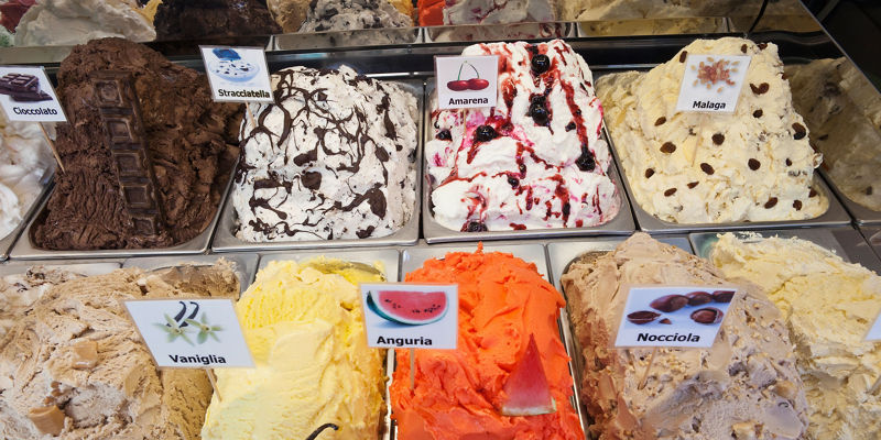 Assorted gelato flavors in display case