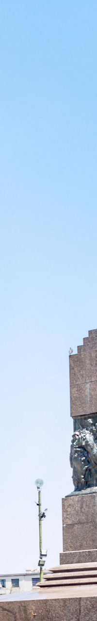 Equestrian statue in urban plaza setting