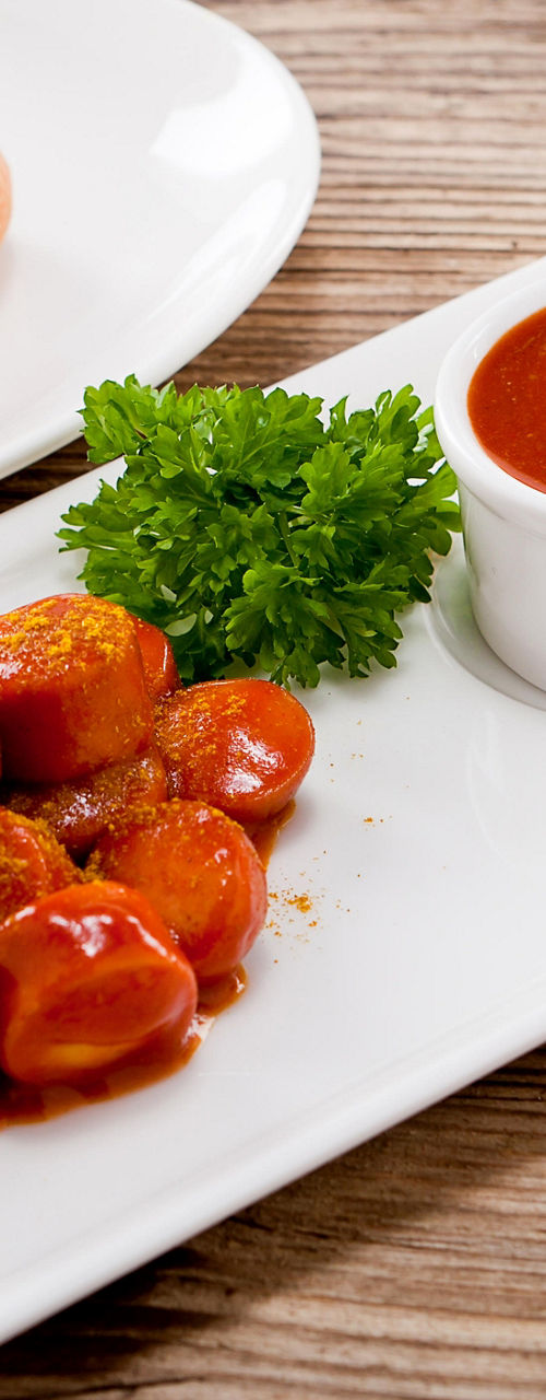Currywurst with Sauce and Bread Roll