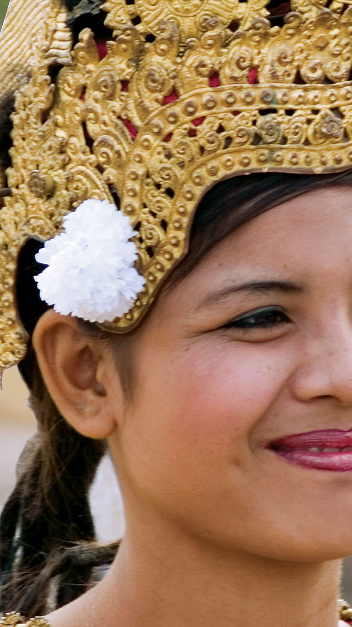 Traditional Cambodian dancers in ornate costumes