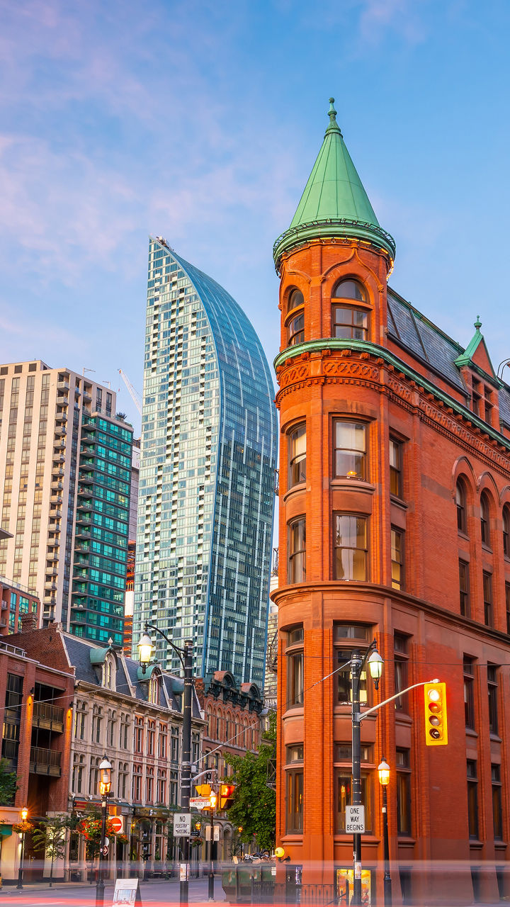 Historic red brick building in Toronto cityscape