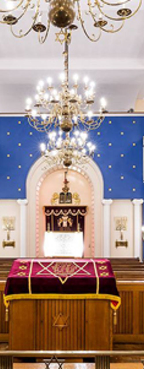 Elegant synagogue interior with chandeliers
