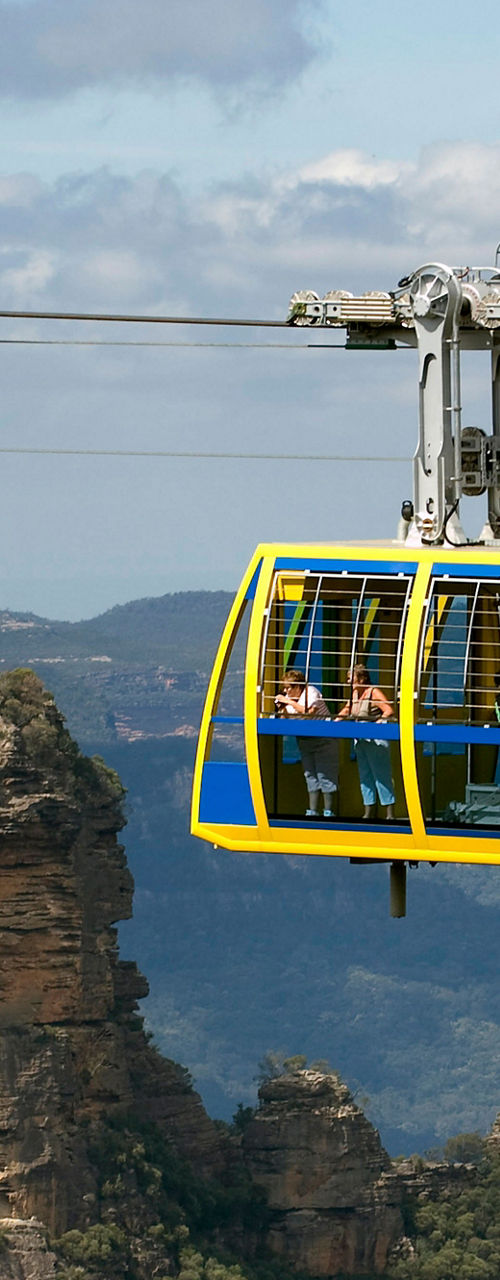 Scenic cable car near rocky cliffs