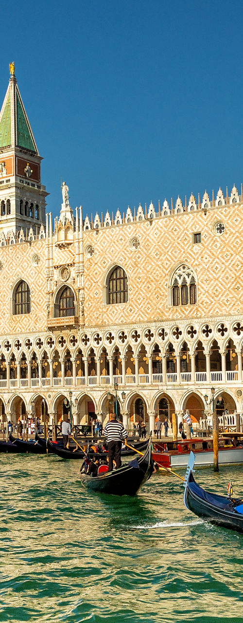 Gondolas on Grand Canal by historic palace