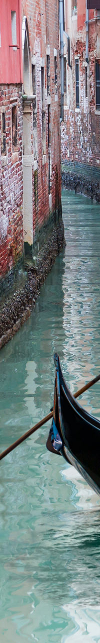 Gondola Ride Through Venetian Canal