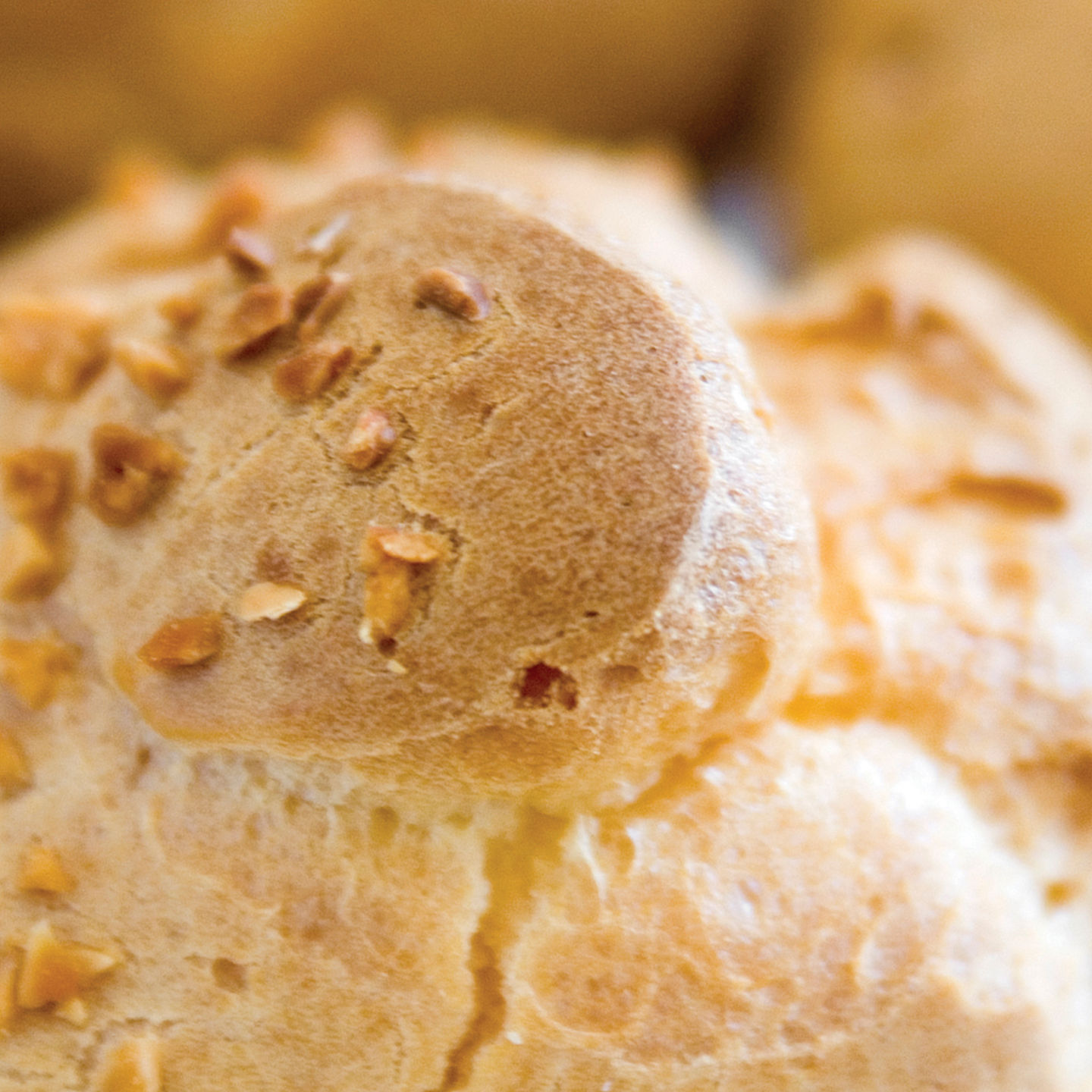 Freshly baked bread rolls on cooling rack