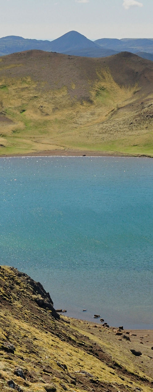 Scenic volcanic lake in rugged landscape