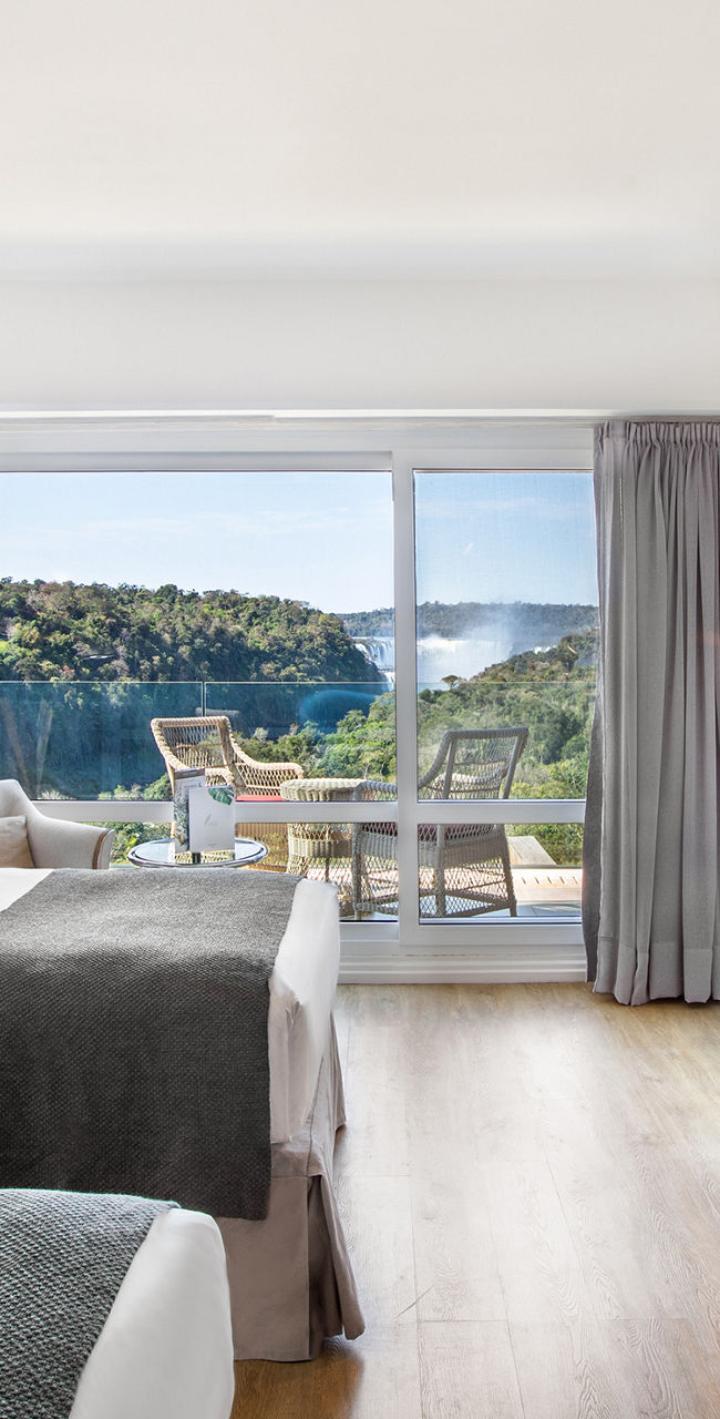 Modern hotel room with scenic balcony view