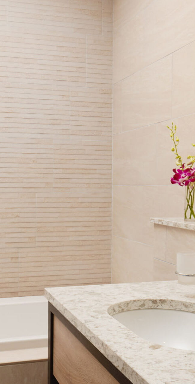 Modern Beige Bathroom With Marble Countertop and Tub