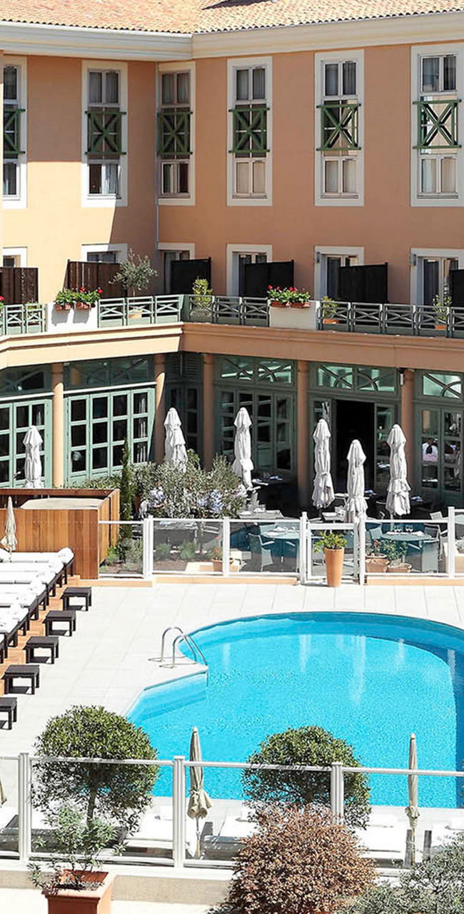 Elegant hotel courtyard with pool view